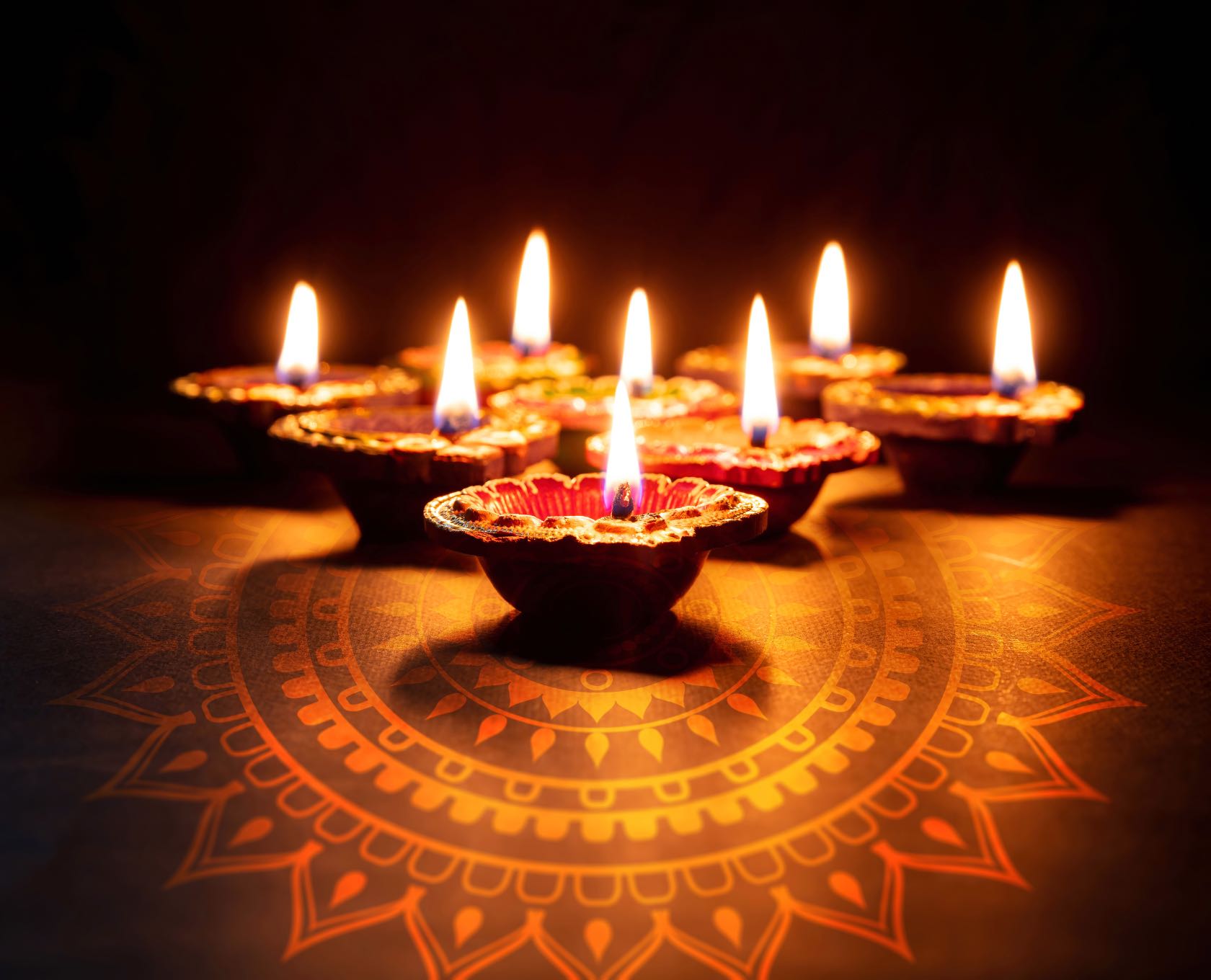 candles on a table during diwali